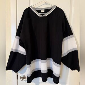 Athletic knit Black and White Striped Hockey Jersey size L lightly worn